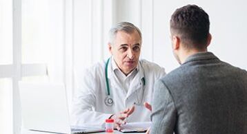 a man at a specialist meeting